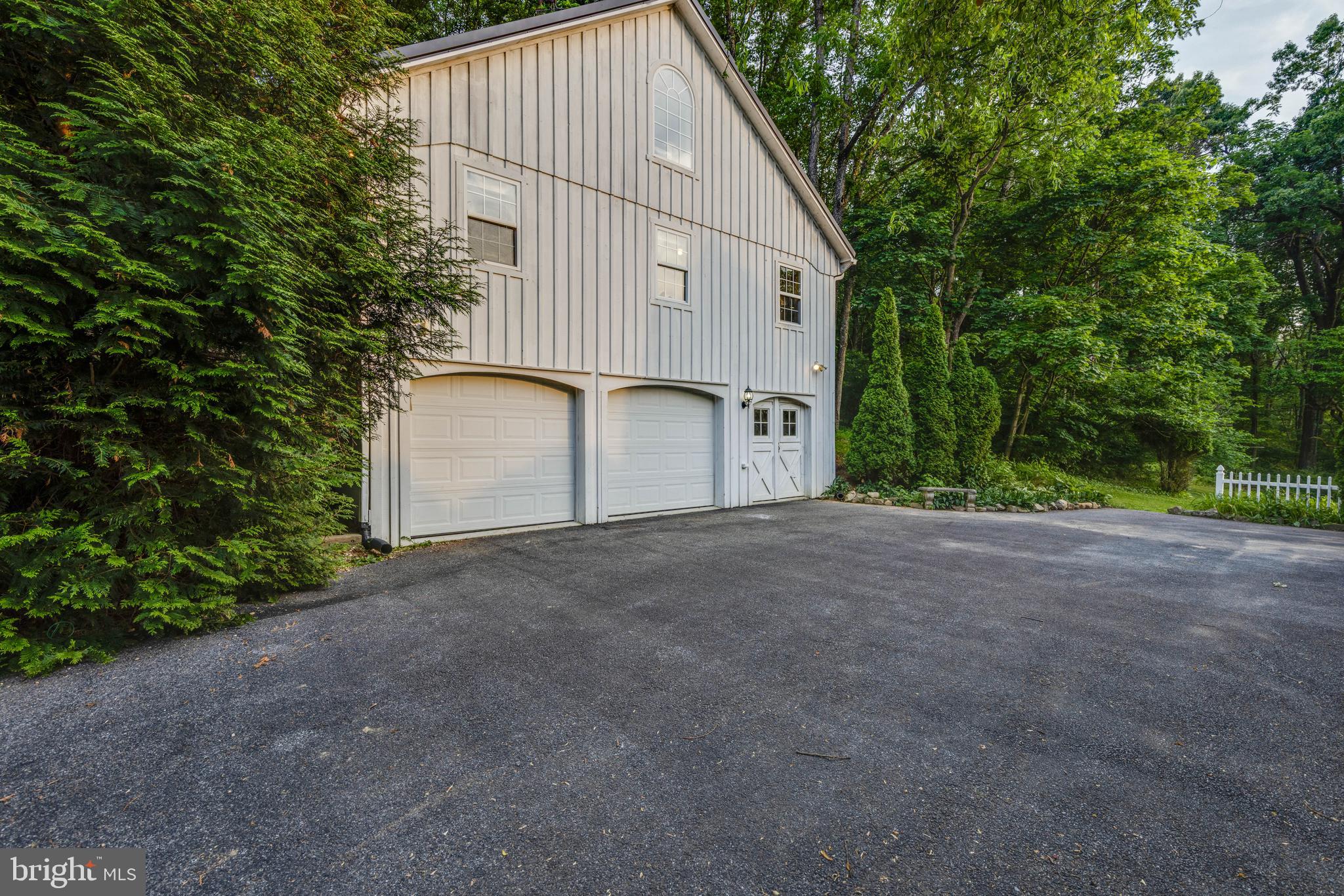 1801 Stringtown Road Sparks Glencoe, MD 21152 - Photo 16 of 26 a view of a house with a yard and garage