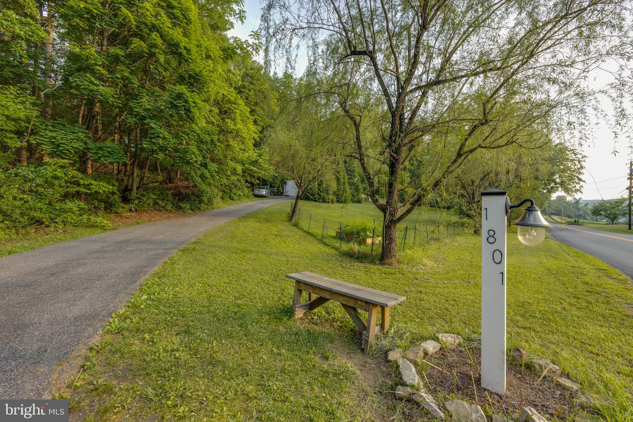 1801 Stringtown Road Sparks Glencoe, MD 21152 - Photo 26 of 26 a garden with trees in the background