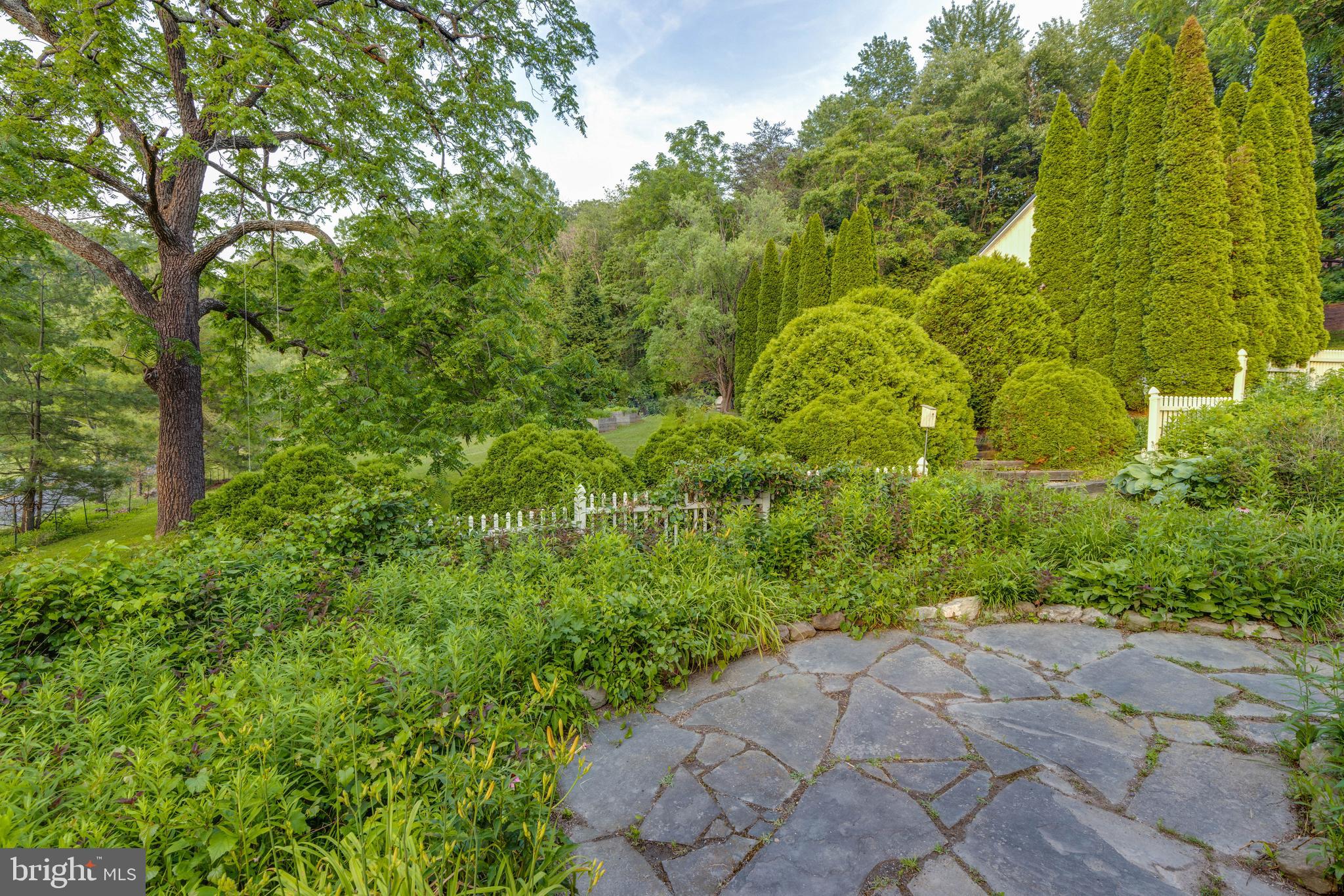 1801 Stringtown Road Sparks Glencoe, MD 21152 - Photo 3 of 26 a view of a garden with plants