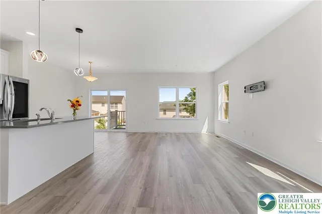 a view of kitchen with wooden floor