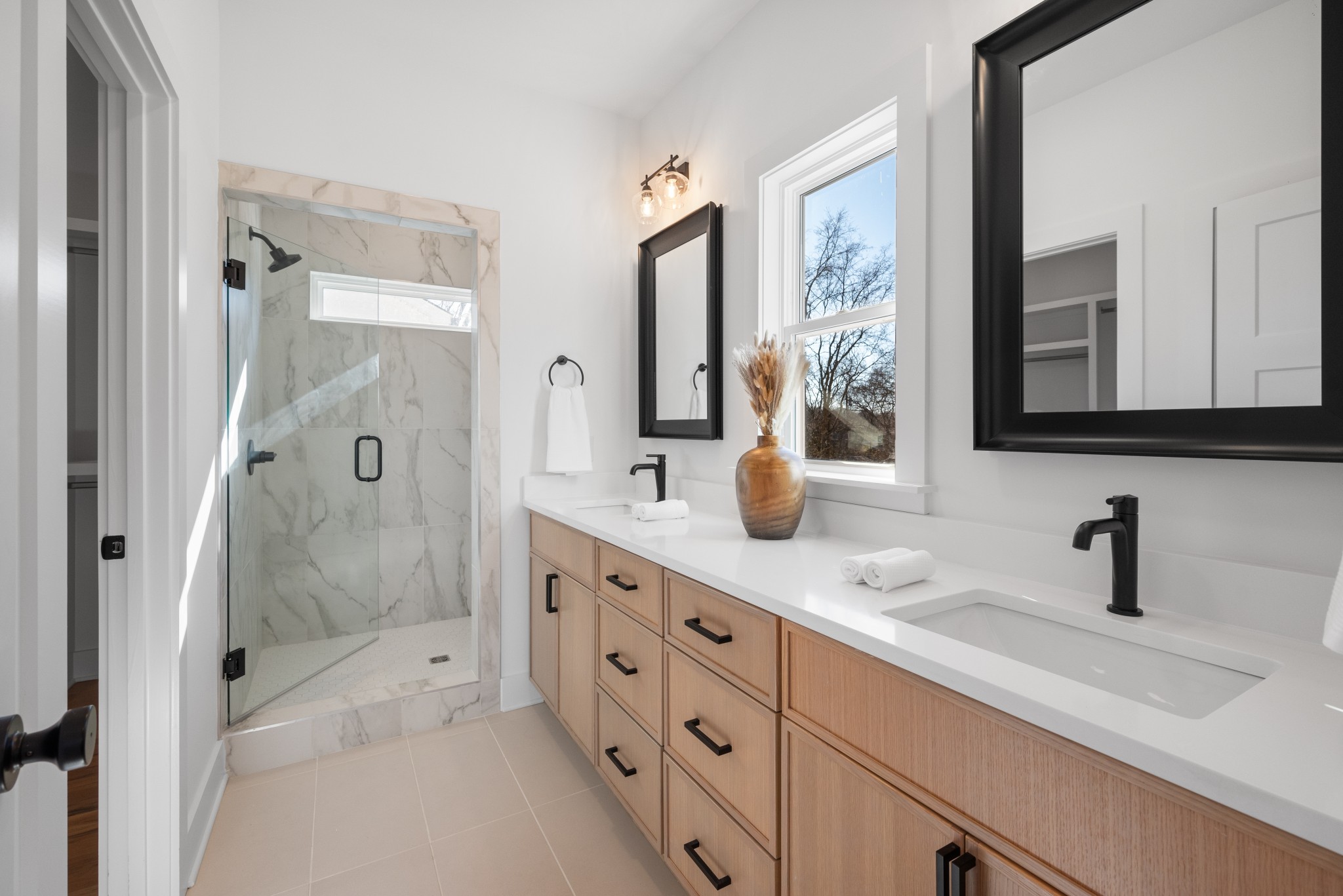 142 Lanier Drive Madison, TN 37115 - Photo 8 of 23 a bathroom with a shower sink and mirror