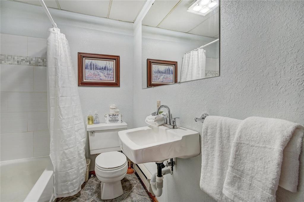 357 County Road 628 Breckenridge, CO 80424 - Photo 19 of 28 a bathroom with a sink toilet and a mirror
