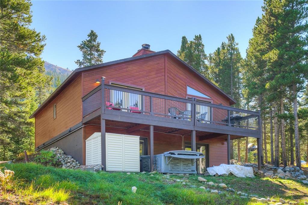 357 County Road 628 Breckenridge, CO 80424 - Photo 28 of 28 a front view of a house with a garden and plants