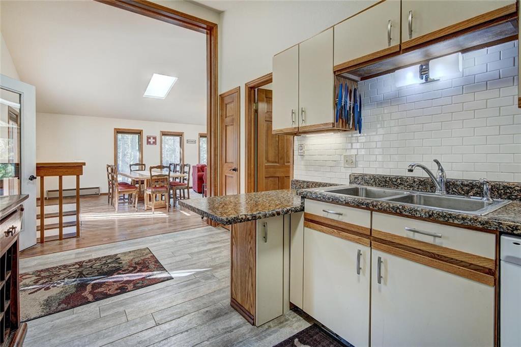 357 County Road 628 Breckenridge, CO 80424 - Photo 10 of 28 a kitchen with stainless steel appliances granite countertop a sink stove and cabinets