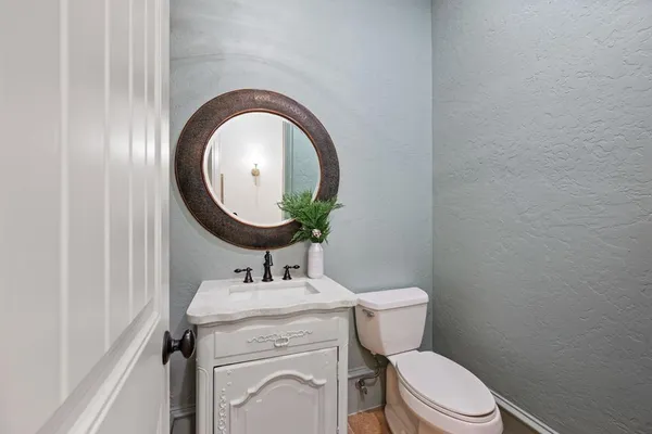 a view of a livingroom with furniture and a window