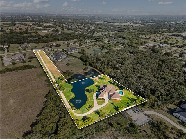 an aerial view of a backyard
