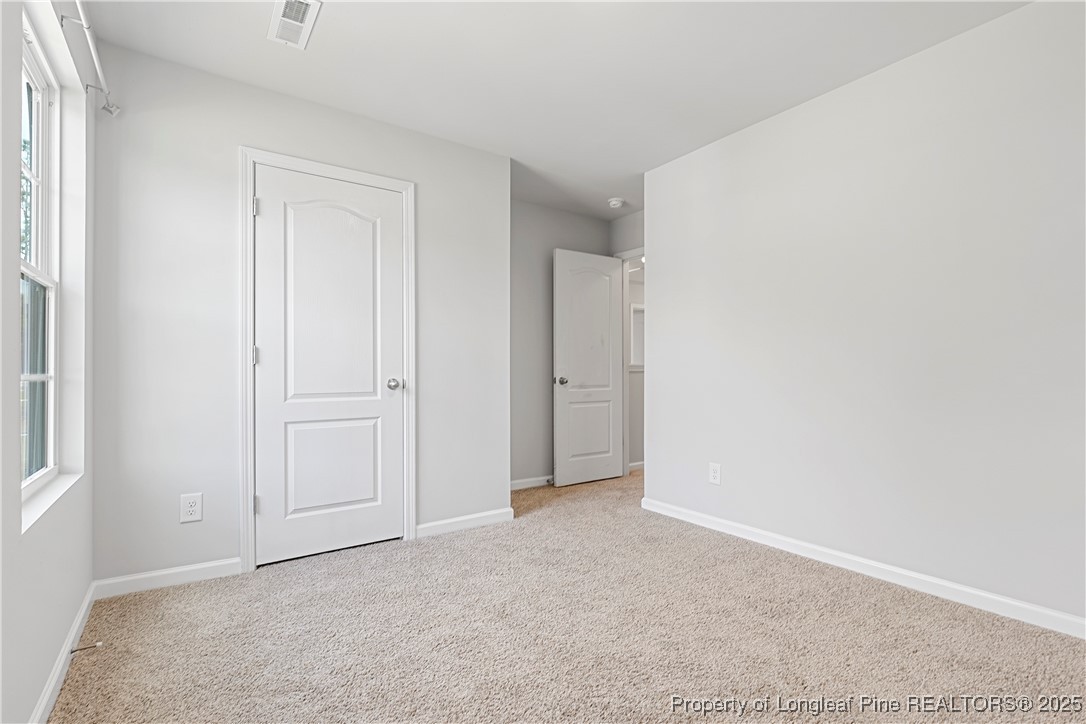191 Mildred Way Aberdeen, NC 28315 - Photo 17 of 26 a view of an empty room