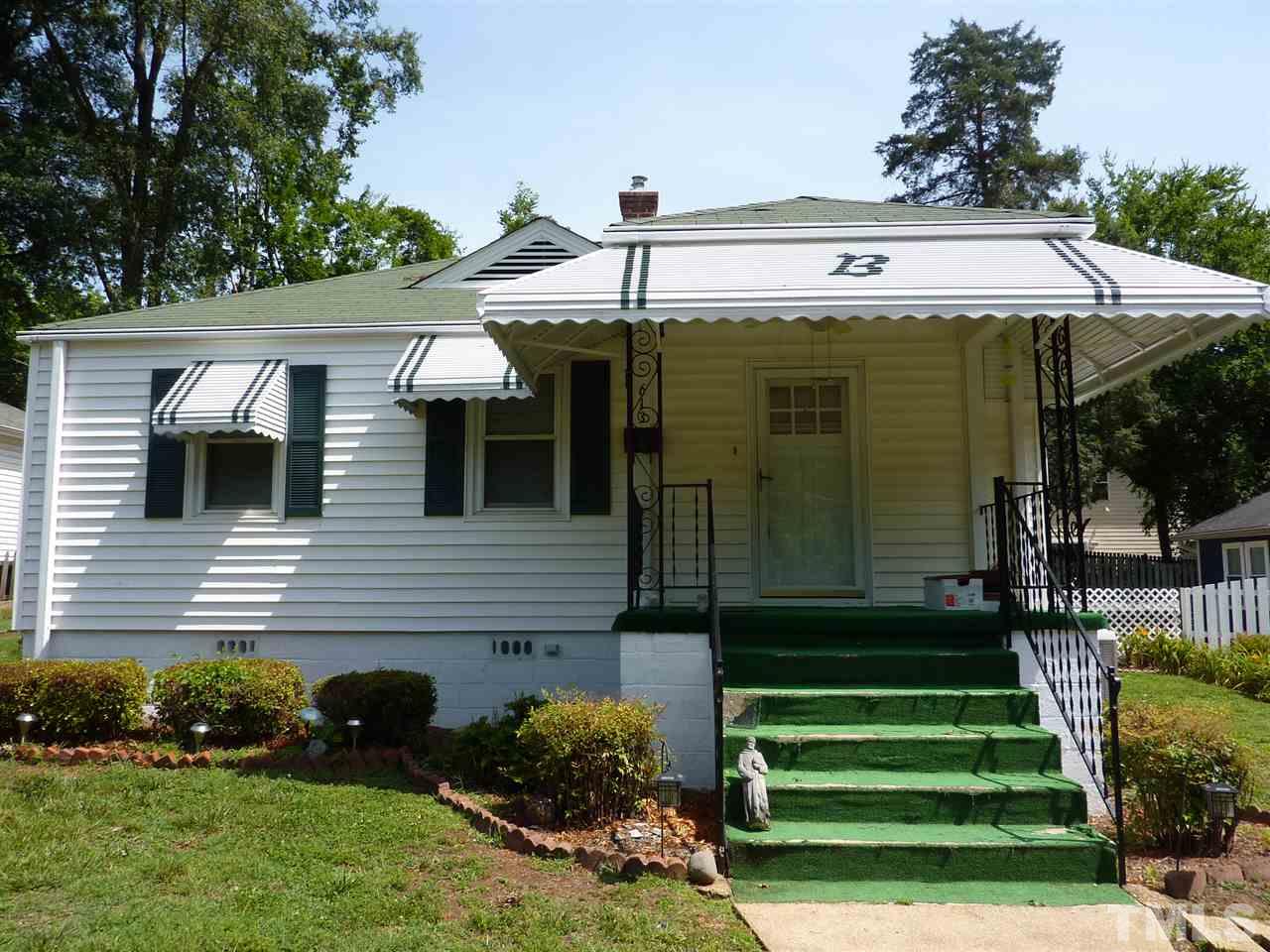 613 Harding Street Raleigh, NC 27604 - Photo 1 of 9 a view of a house with a yard