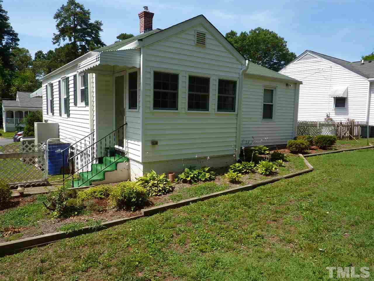 613 Harding Street Raleigh, NC 27604 - Photo 2 of 9 a front view of a house with a garden