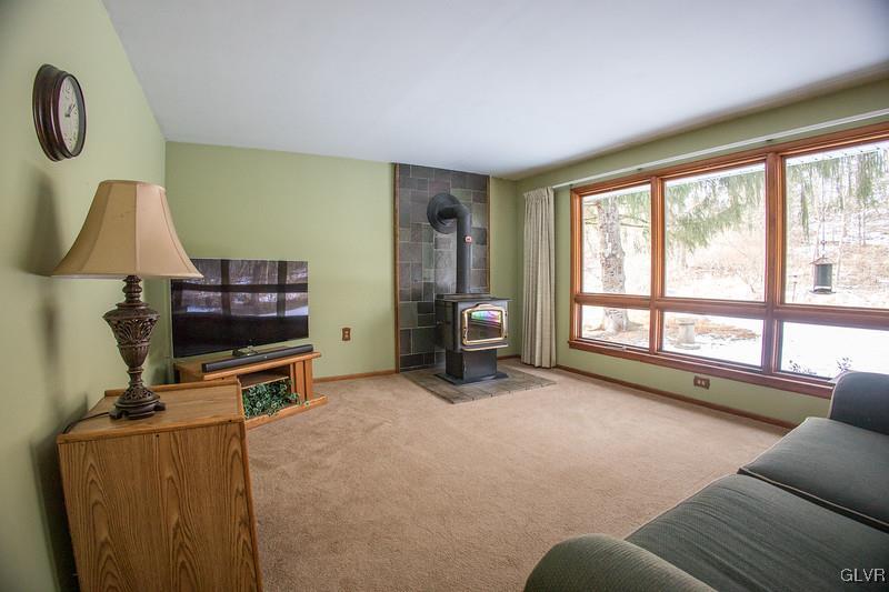 2491 Yost Road Bath, PA 18014 - Photo 17 of 42 a room with furniture and a flat screen tv