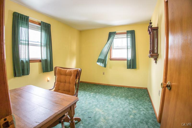 2491 Yost Road Bath, PA 18014 - Photo 29 of 42 wooden floor and chair in a room