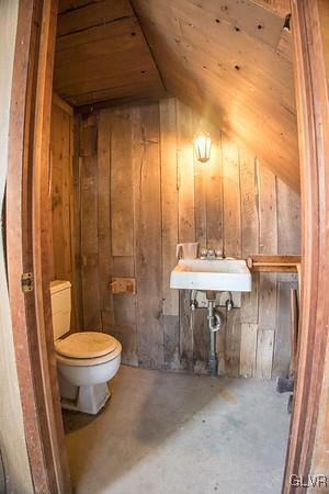 2491 Yost Road Bath, PA 18014 - Photo 31 of 42 a bathroom with a sink a toilet and a mirror