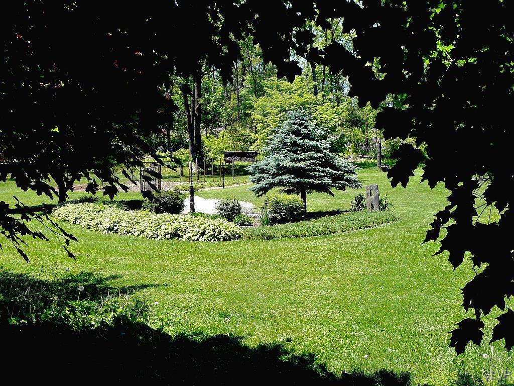 2491 Yost Road Bath, PA 18014 - Photo 36 of 42 a view of a garden with a tree