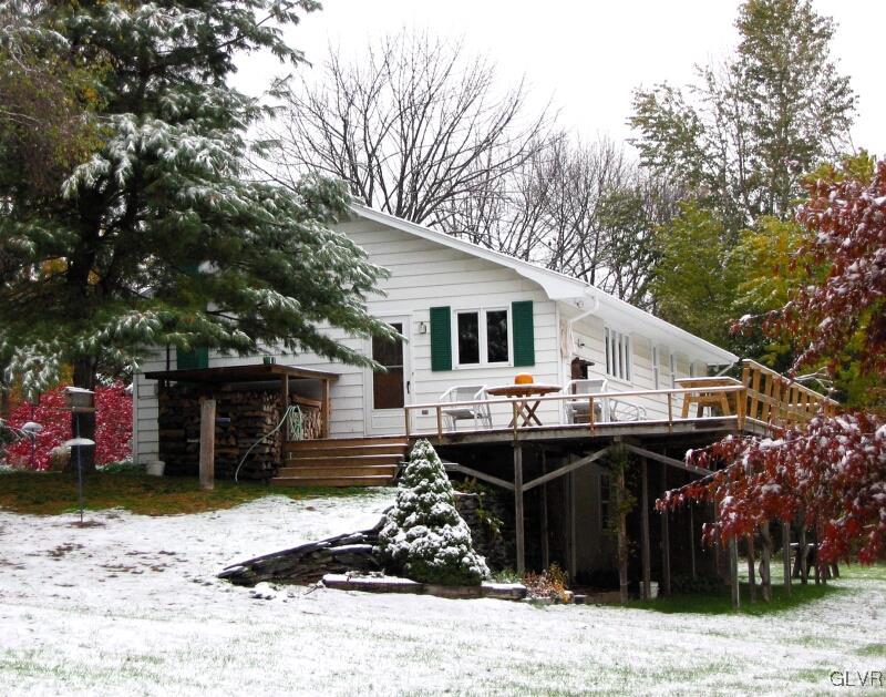 2491 Yost Road Bath, PA 18014 - Photo 4 of 42 a front view of a house with a sitting area