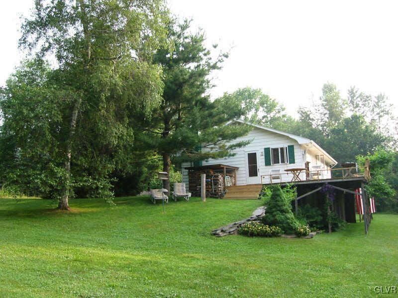 2491 Yost Road Bath, PA 18014 - Photo 5 of 42 a front view of house with a garden