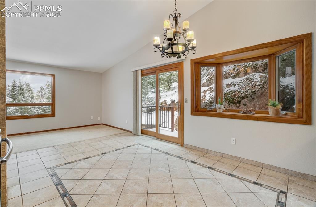 5865 Waterfall Loop Manitou Springs, CO 80829 - Photo 7 of 45 Dining area/Kitchen with a bay window and walk out to a private deck!