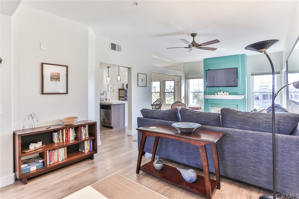 Welcome to your wonderful Beach Condo. Great room includes, living room, kitchen, dining area and deck.