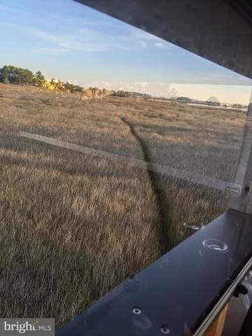 a view of a yard from a balcony