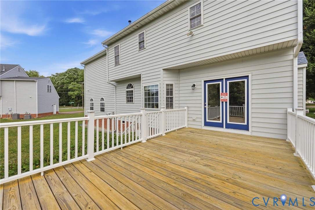 4180 Innesbrook Road Glen Allen, VA 23060 - Photo 45 of 54 Expansive wood deck with white railing, featuring