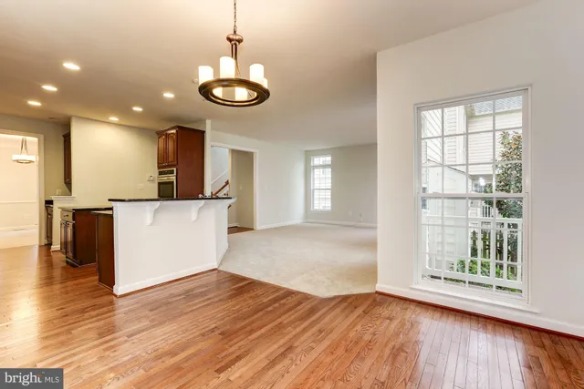 a bathroom with a sink toilet and a mirror