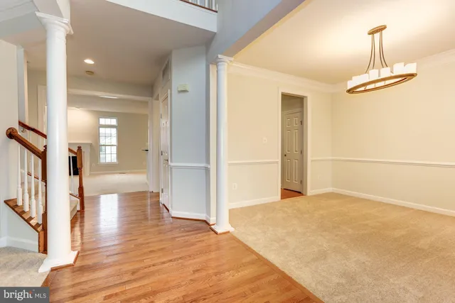 a view of a livingroom with wooden floor
