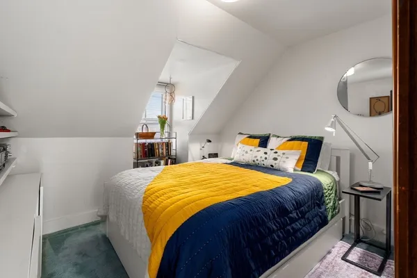 a room with furniture and window