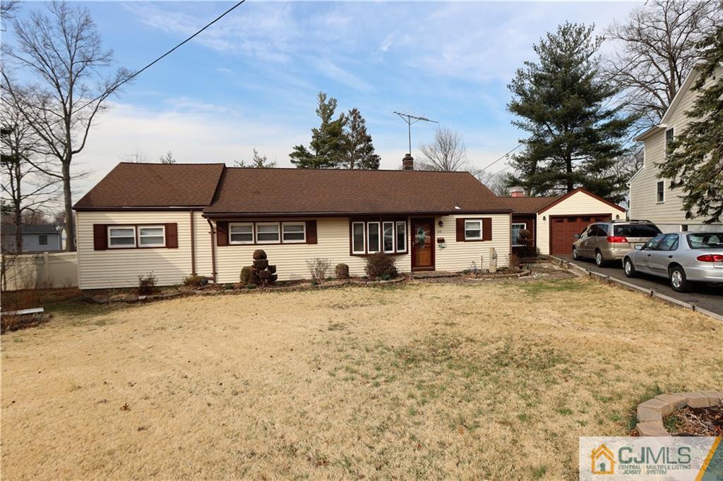 120 South Hill Road Colonia, NJ 07067 - Photo 1 of 26 a front view of a houses with yard