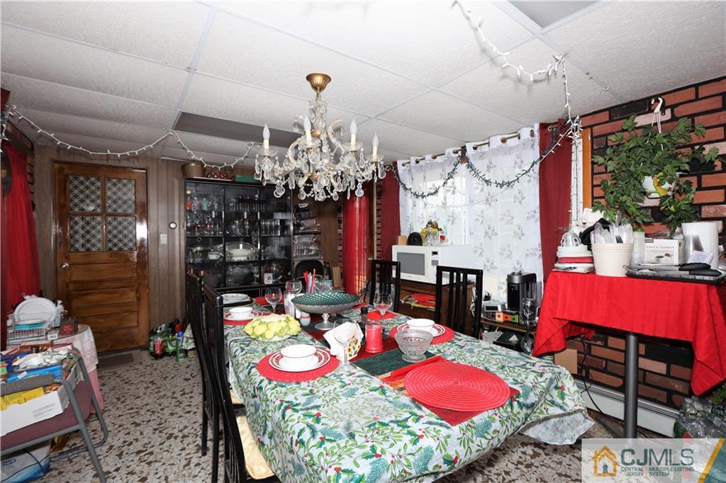 120 South Hill Road Colonia, NJ 07067 - Photo 17 of 26 a room with musical instrument pool table and chairs