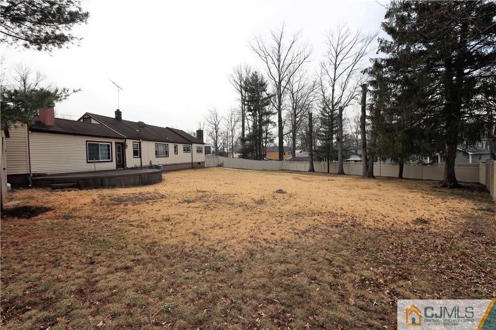 120 South Hill Road Colonia, NJ 07067 - Photo 20 of 26 a view of a yard with a house
