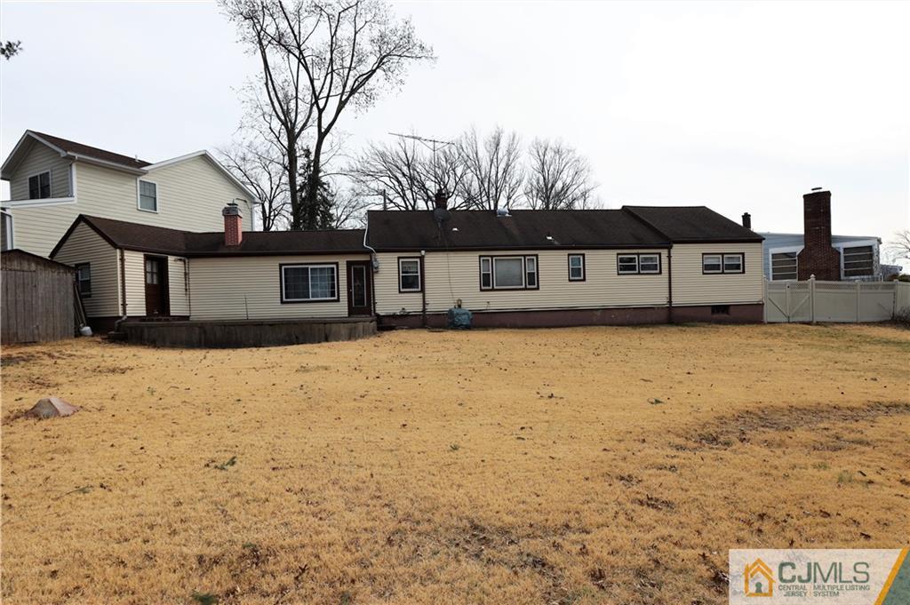 120 South Hill Road Colonia, NJ 07067 - Photo 21 of 26 a front view of a house with a yard