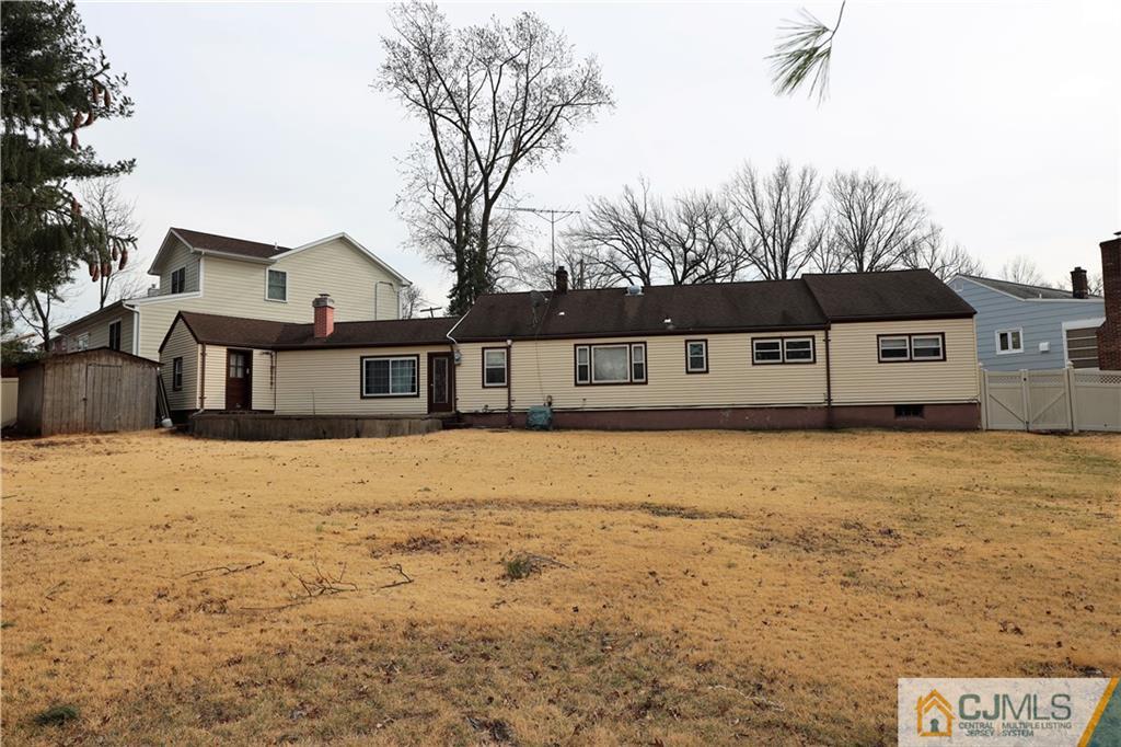 120 South Hill Road Colonia, NJ 07067 - Photo 22 of 26 a front view of a house with a yard