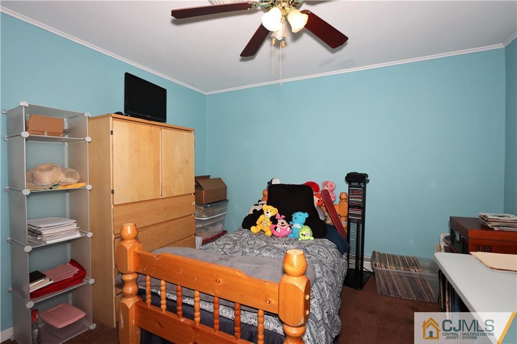 120 South Hill Road Colonia, NJ 07067 - Photo 10 of 26 a bedroom with furniture and a bed
