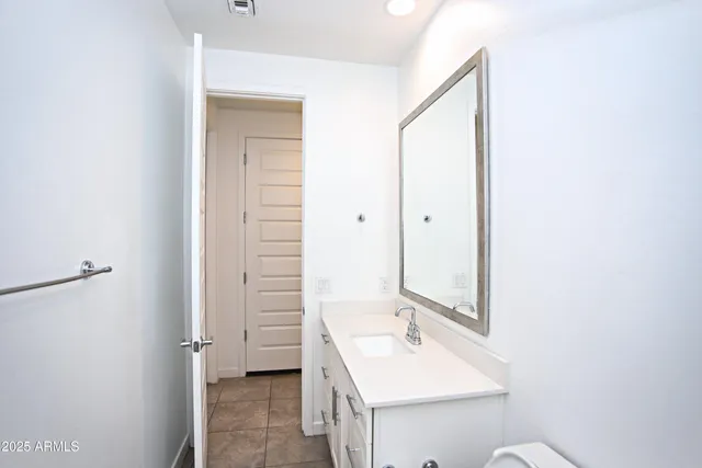 a view of a kitchen with a sink cabinets and outdoor space