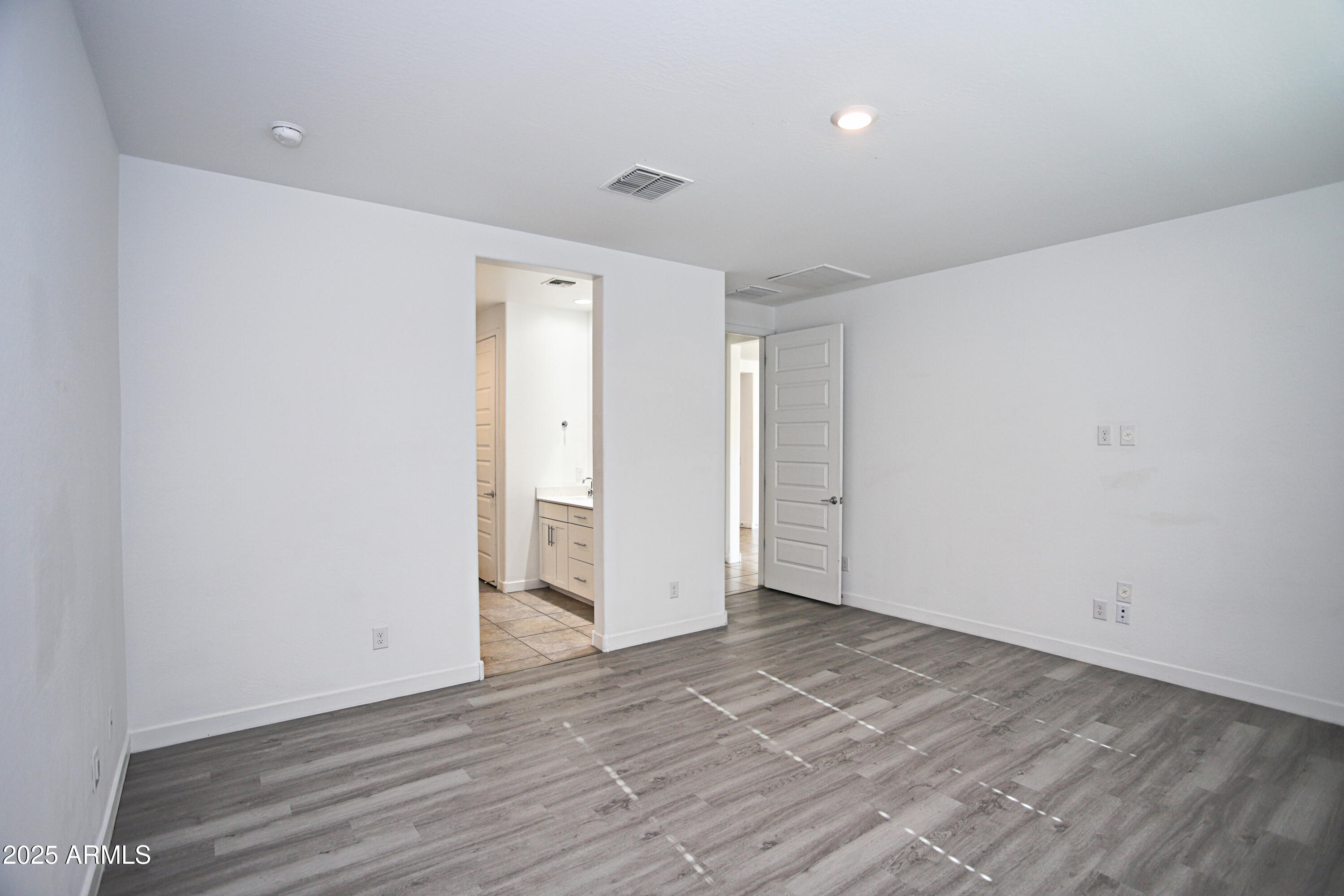 1535 West Corral Road Phoenix, AZ 85041 - Photo 24 of 39 a view of an empty room