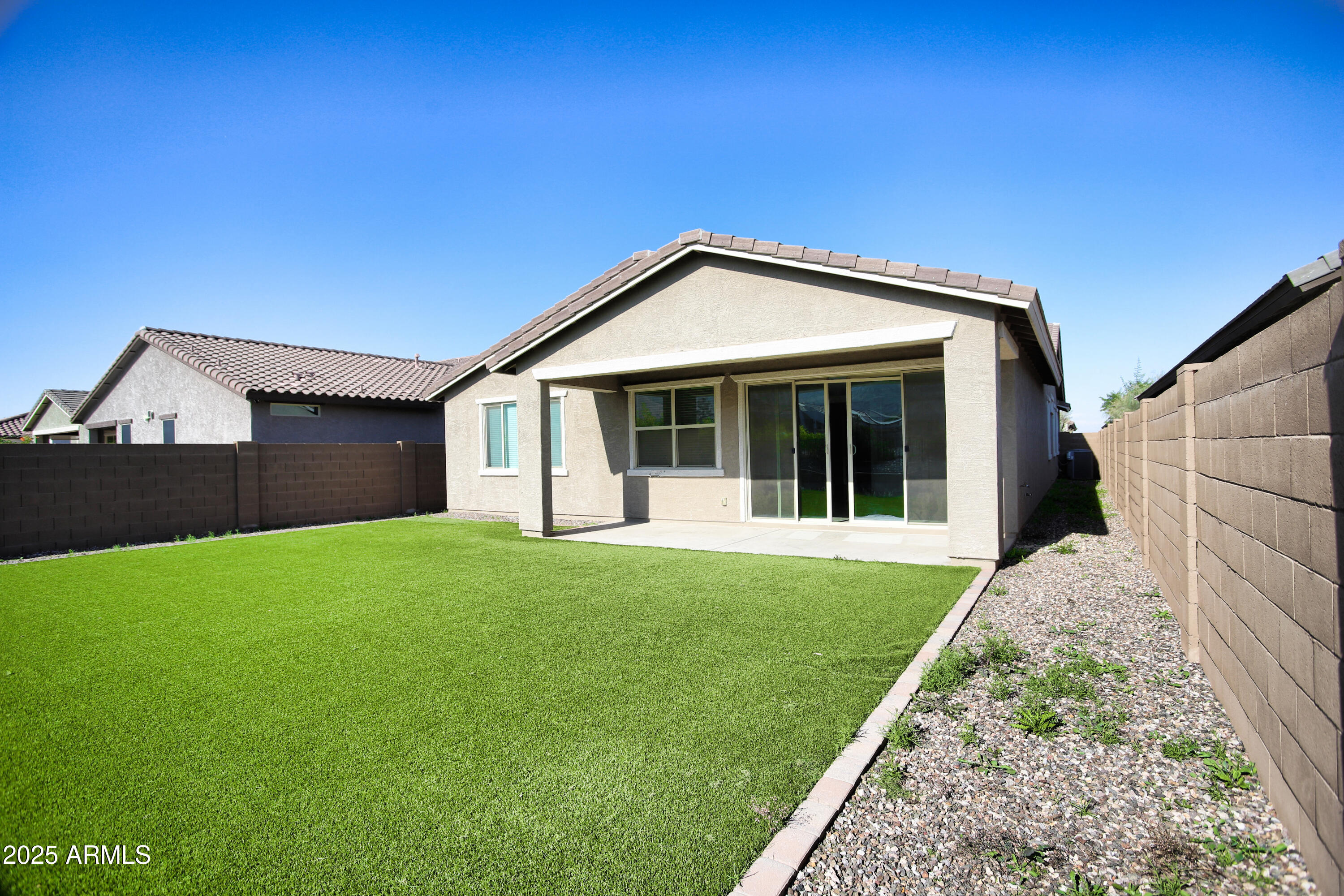 1535 West Corral Road Phoenix, AZ 85041 - Photo 34 of 39 a view of a house with backyard