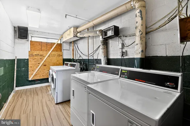 a kitchen with a sink and a microwave