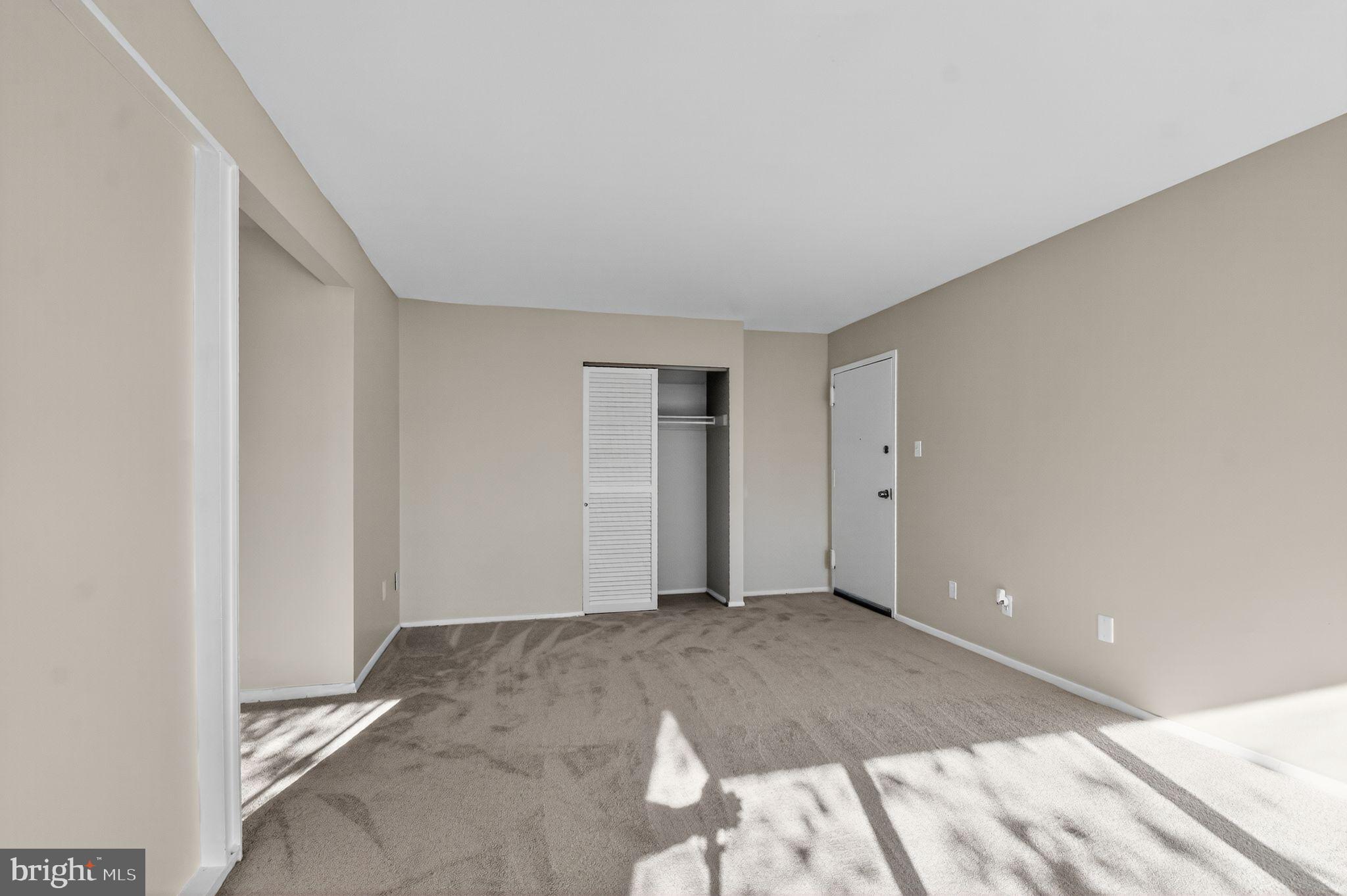 7957 Riggs Road, Unit 7 Hyattsville, MD 20783 - Photo 9 of 15 a view of livingroom with an empty space