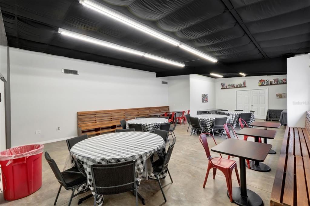 5821 Pit Road Bushnell, FL 33513 - Photo 23 of 35 a view of a dining room with furniture