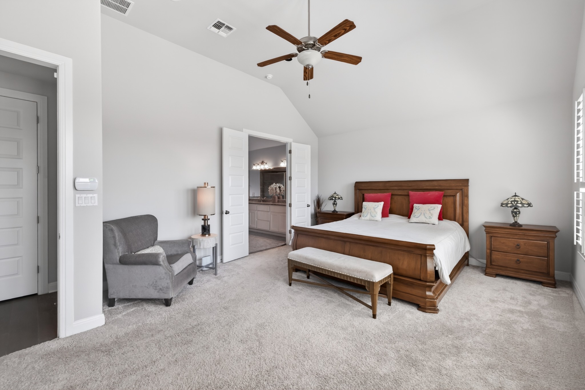 4105 Haight Street Round Rock, TX 78681 - Photo 19 of 40 Carpeted room featuring a vaulted ceiling with a ceiling fan