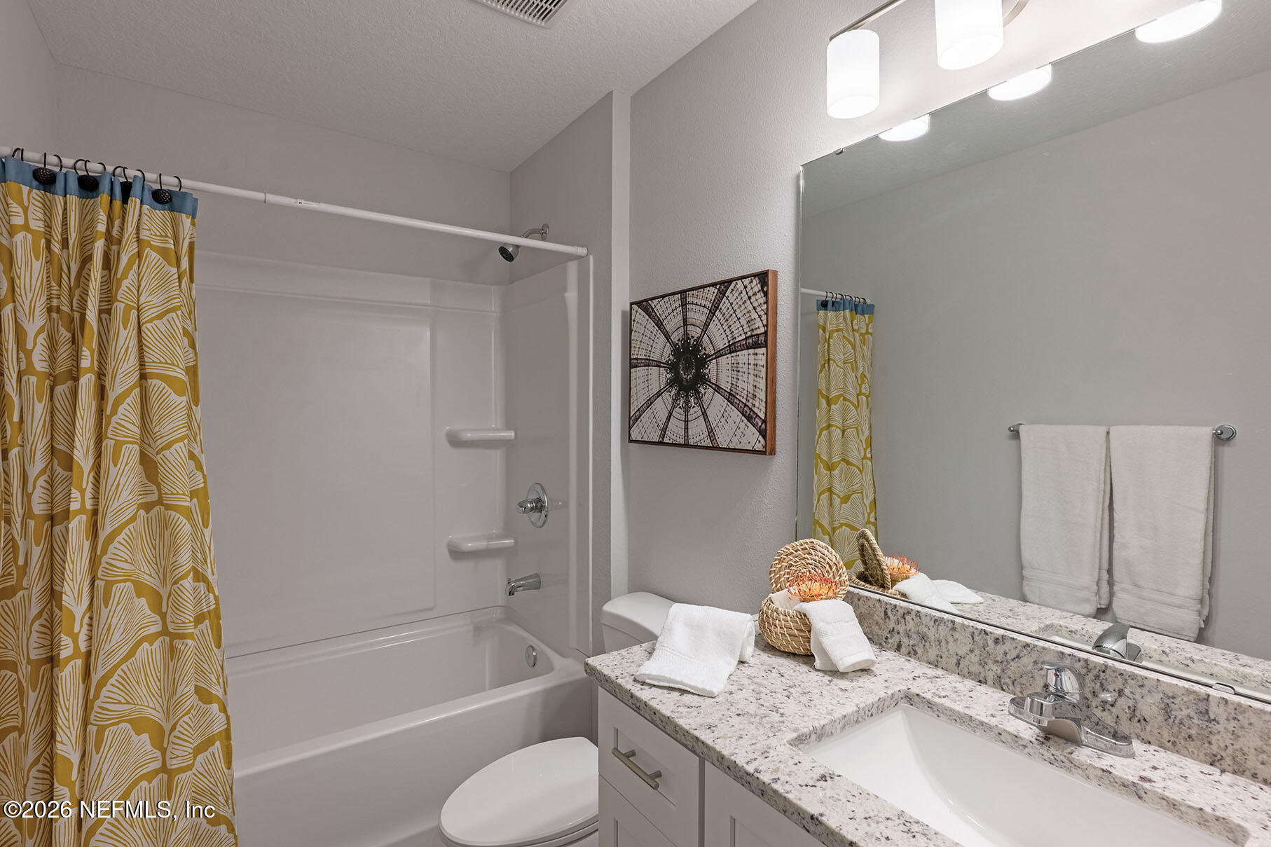 1295 Jewelstone Lane Jacksonville, FL 32221 - Photo 16 of 33 a bathroom with a granite countertop sink toilet and shower