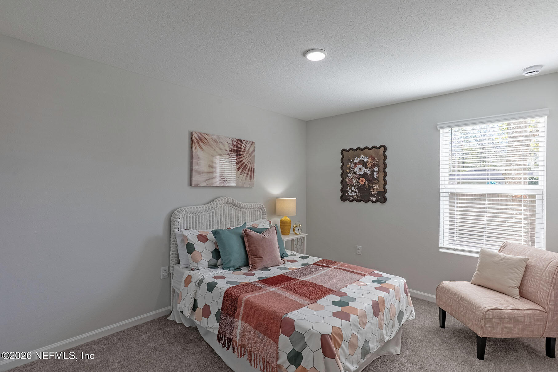 1295 Jewelstone Lane Jacksonville, FL 32221 - Photo 17 of 33 a bedroom with a bed and a couch