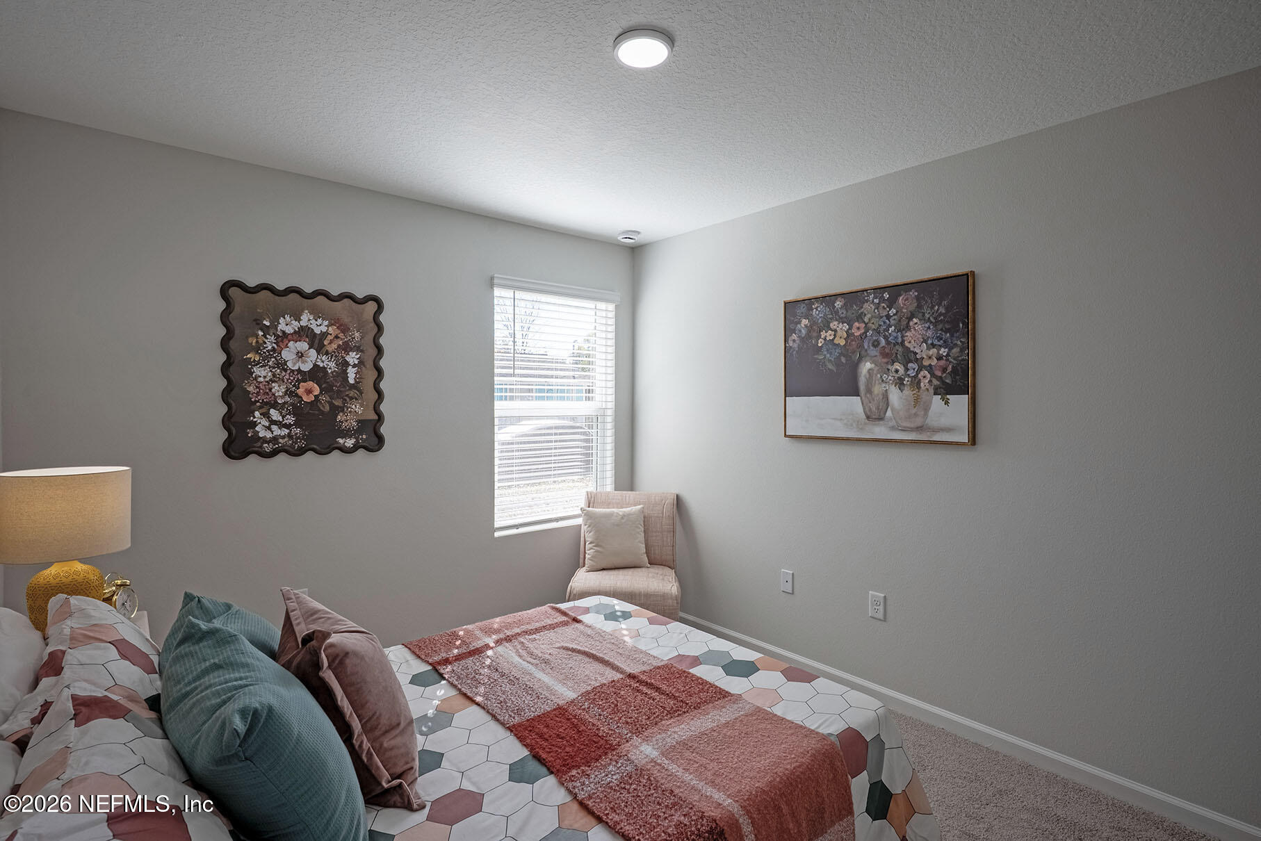 1295 Jewelstone Lane Jacksonville, FL 32221 - Photo 18 of 33 a bedroom with a bed and a window