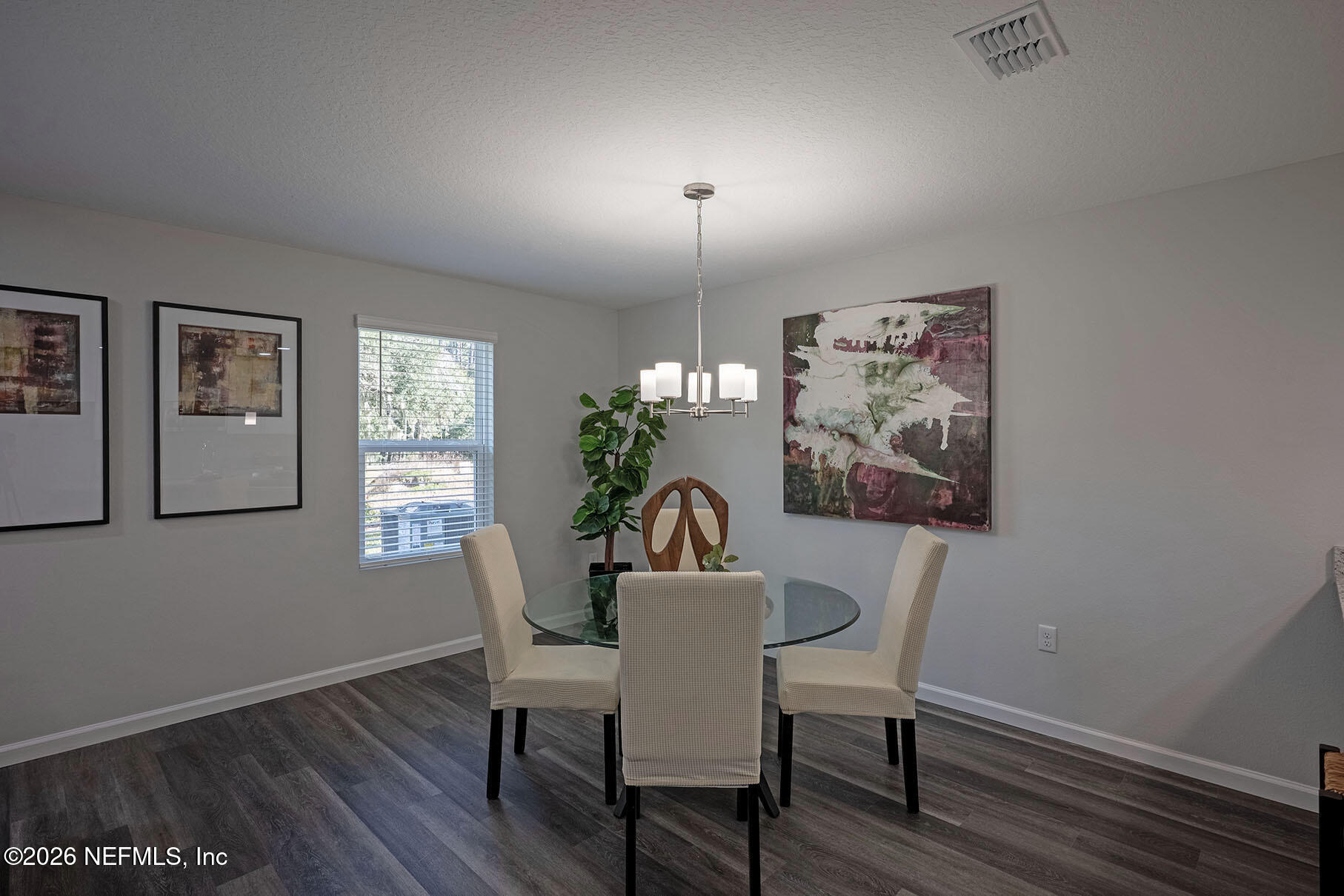 1295 Jewelstone Lane Jacksonville, FL 32221 - Photo 23 of 33 a dining room with furniture and window