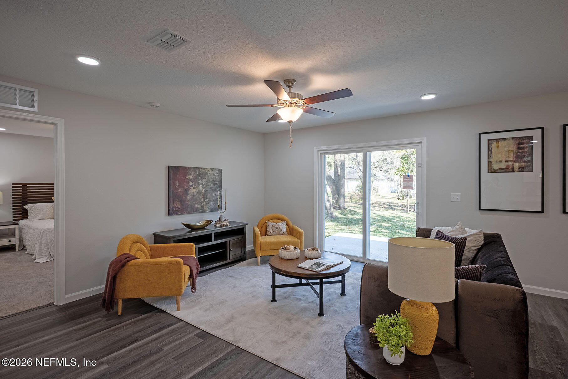 1295 Jewelstone Lane Jacksonville, FL 32221 - Photo 25 of 33 a living room with furniture and a window