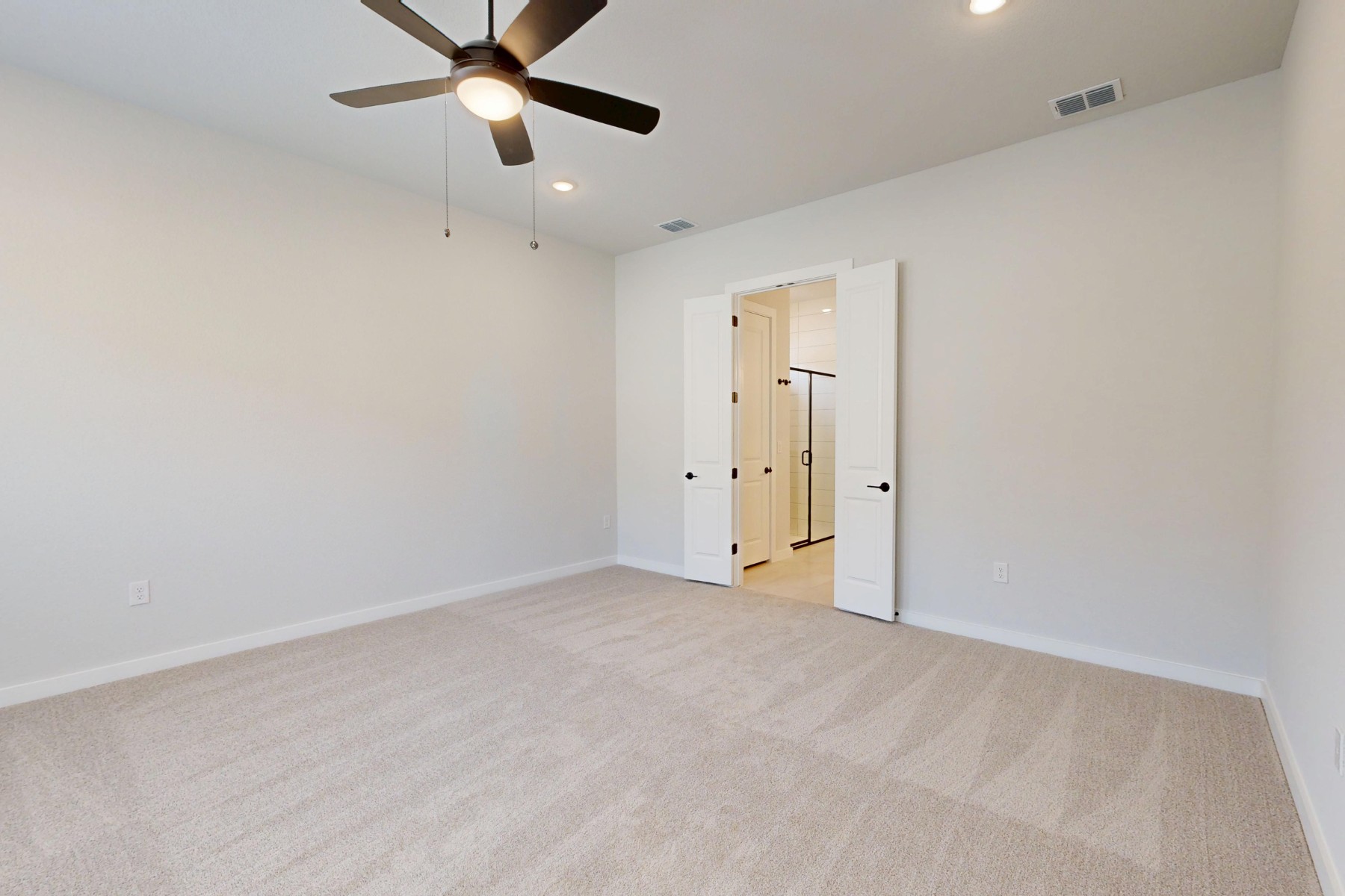812 Boise Drive Leander, TX 78641 - Photo 15 of 35 an empty room with closet and a chandelier fan
