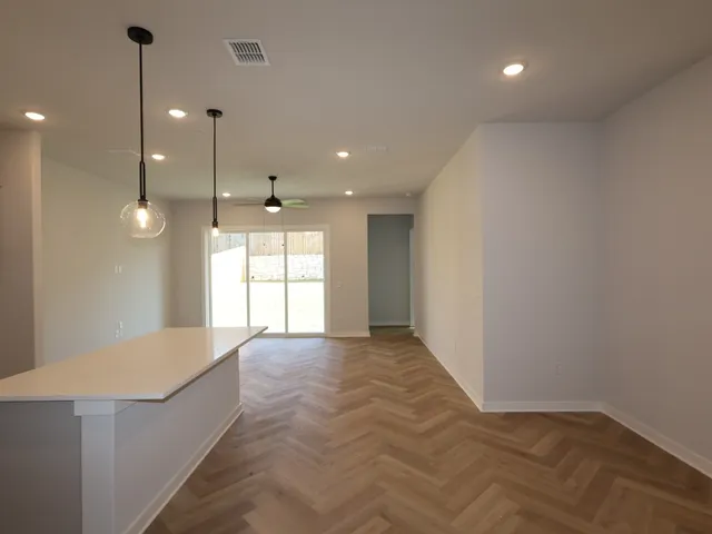a view of an empty room and window