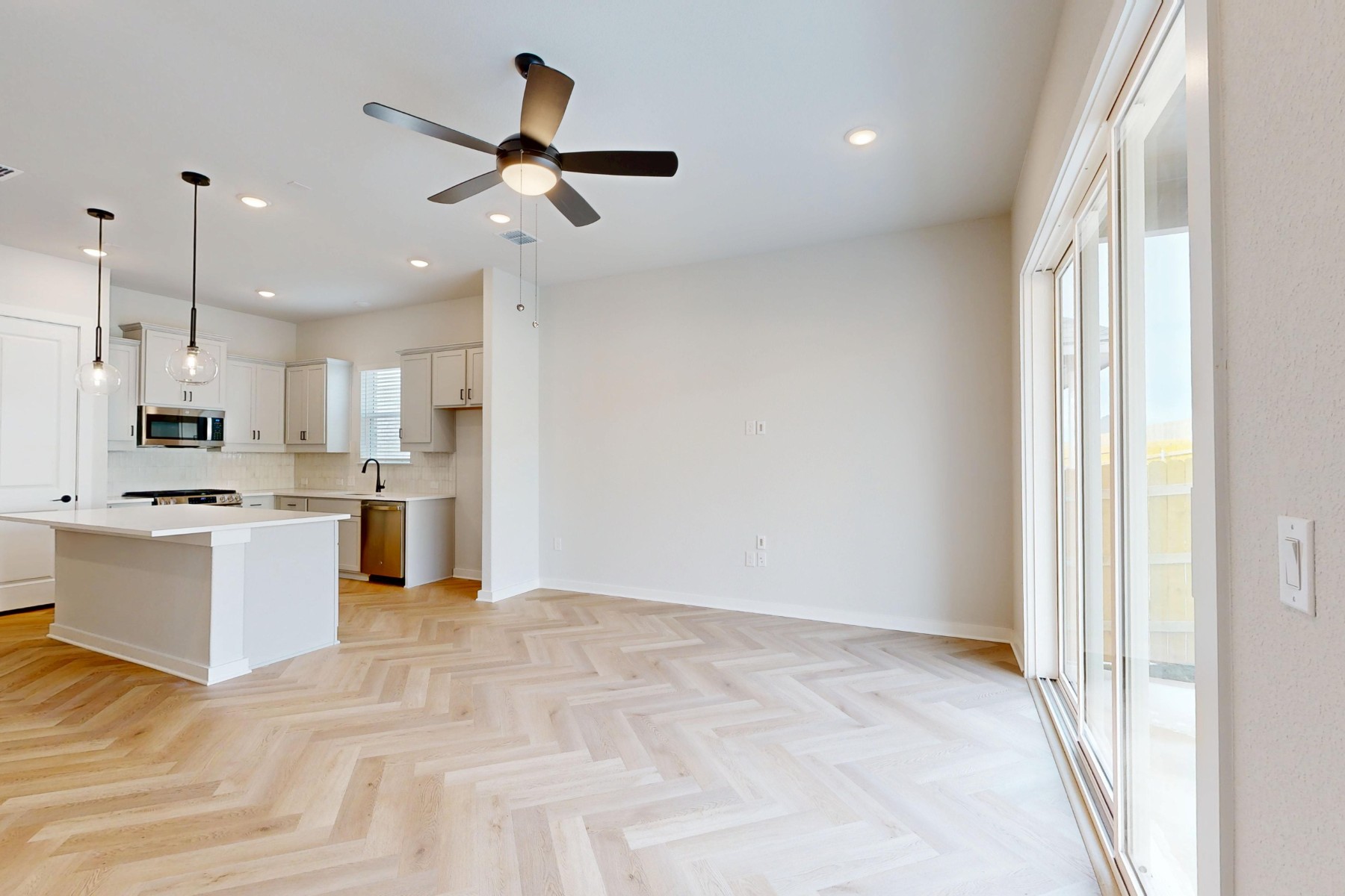 812 Boise Drive Leander, TX 78641 - Photo 9 of 35 a view of kitchen with cabinets microwave and stove