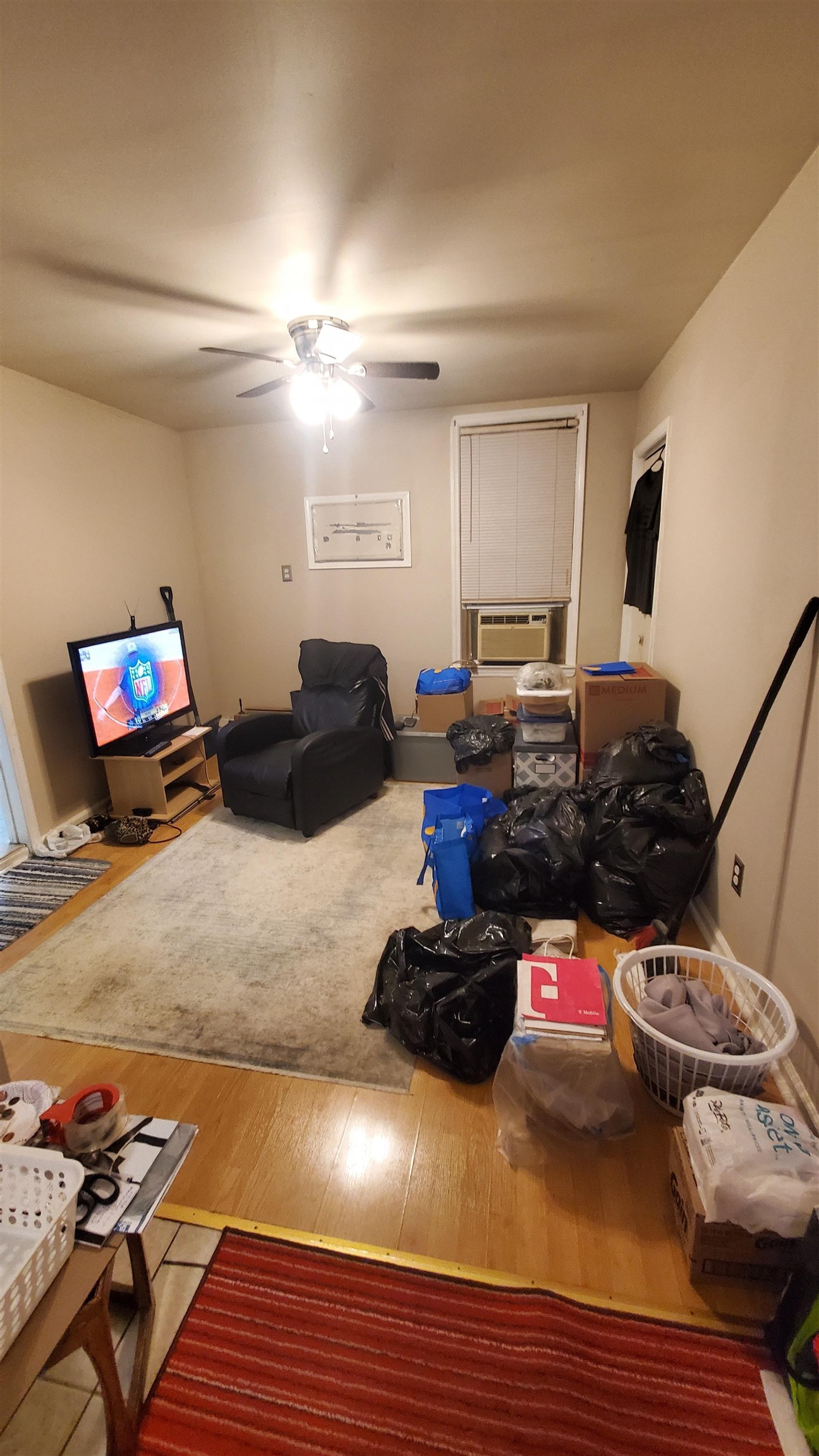 18 Mechanic Street Bayonne, NJ 07002 - Photo 3 of 8 a view of a room with gym equipment
