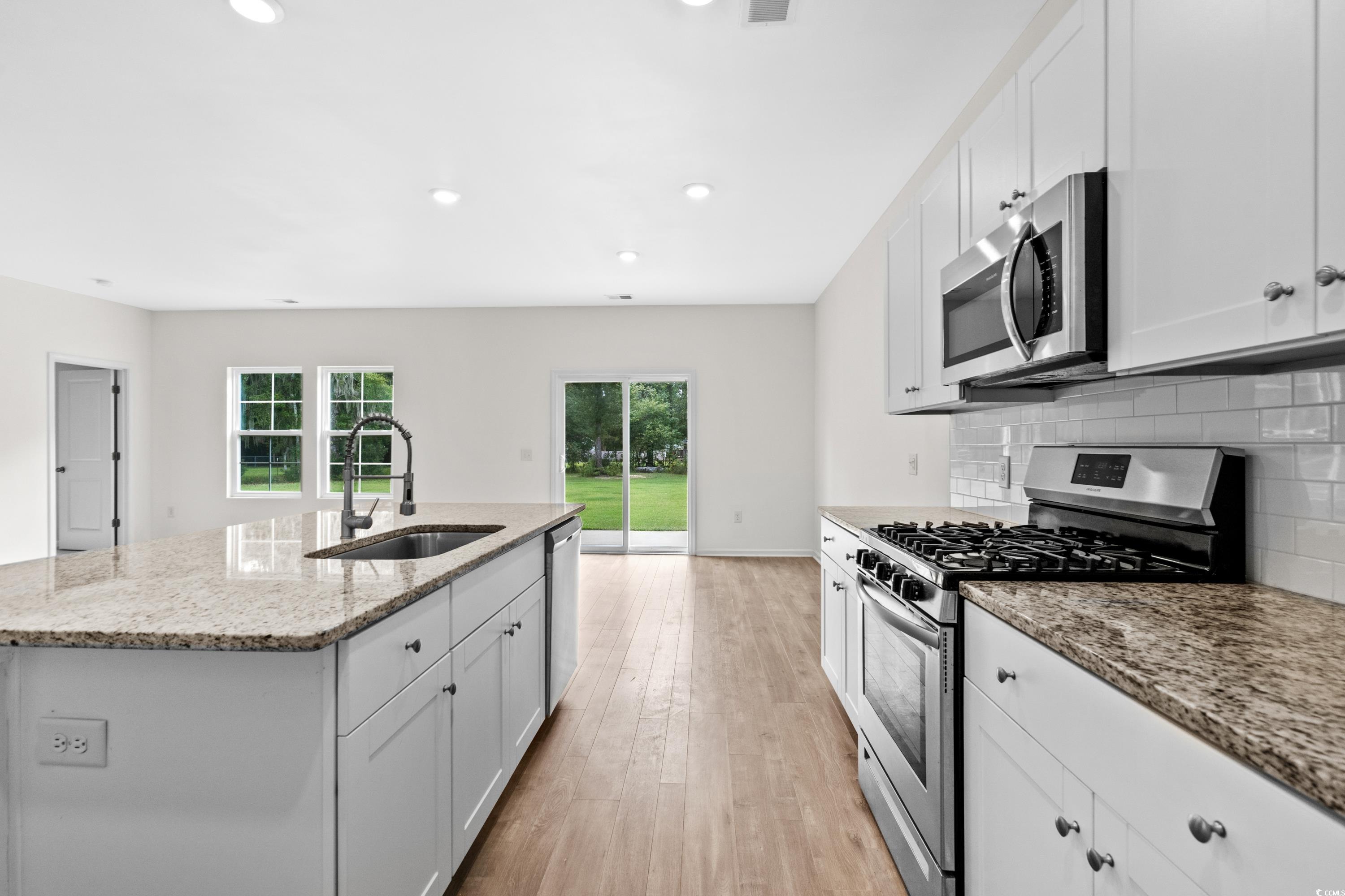 539 Carrick Loop Longs, SC 29568 - Photo 3 of 39 Kitchen with appliances with stainless steel finis
