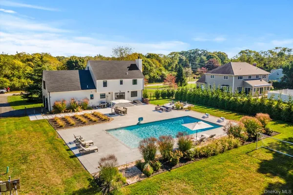 a view of a city with lawn chairs
